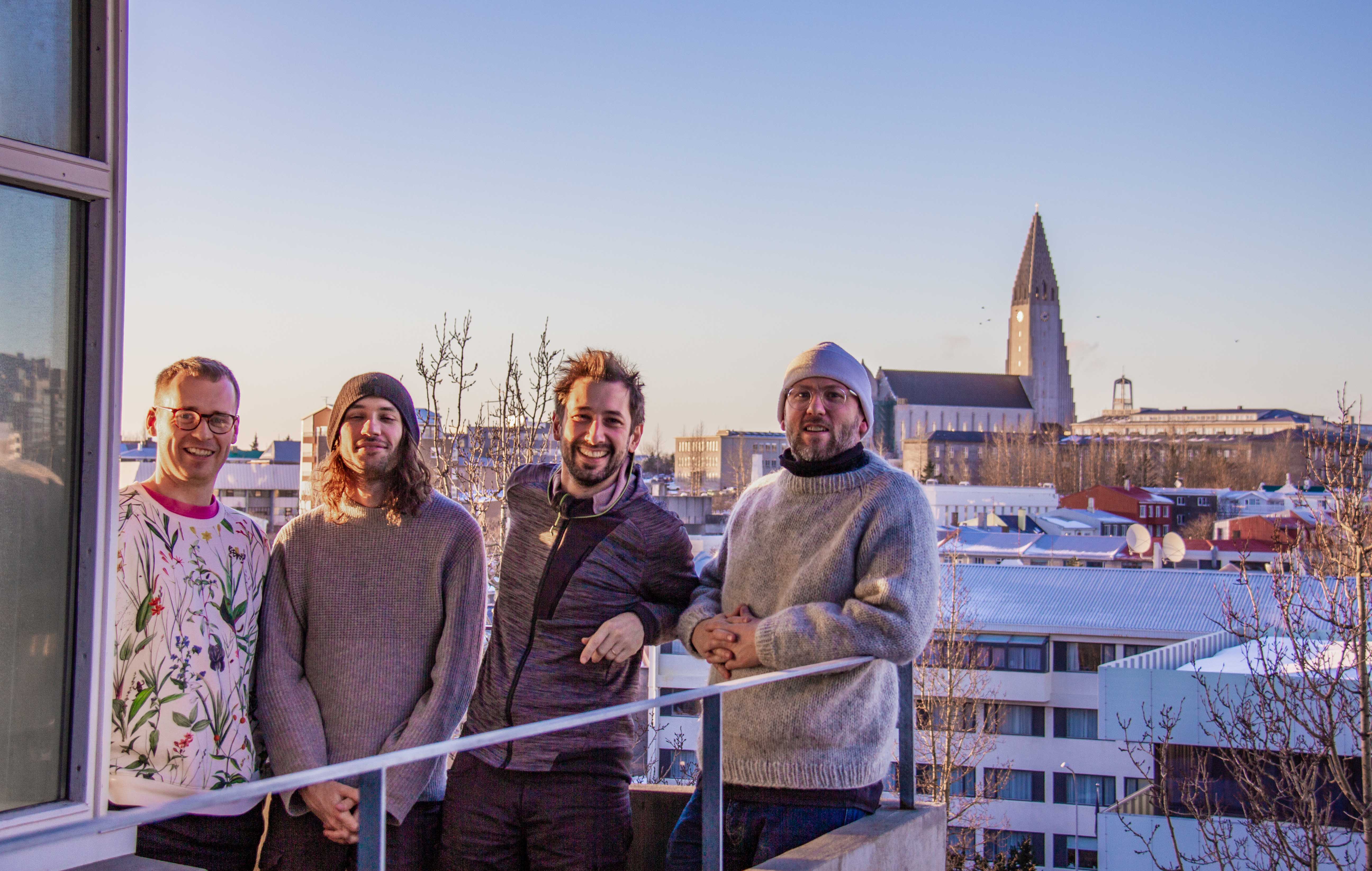 A photo of the IIL team with Hallgrimskirkja in the background.