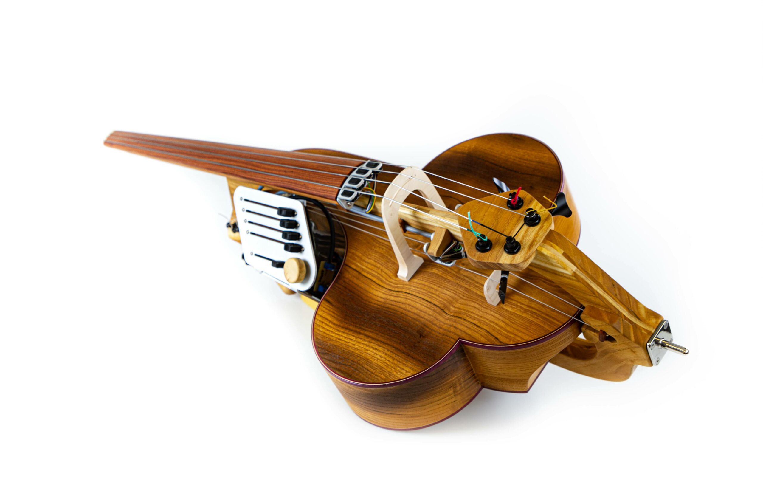 A wooden string instrument with electronic elements.